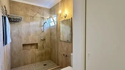 a bedroom with two beds and a desk and a window at Villa Morocco with Heated Private Pool for 12 Guests in Albufeira in Albufeira