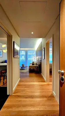a hallway with a living room and a dining room at Sweet Horizon in Quarteira