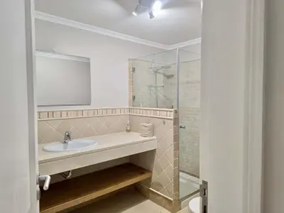 a bedroom with a large white bed and a window at Villa Golf Gardens - Cleverdetails, Vilamoura in Vilamoura