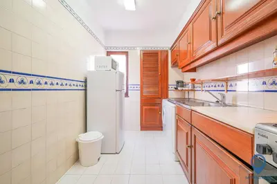 a bathroom with a toilet and a sink and a shower at Salgados by MTPhomes in Guia