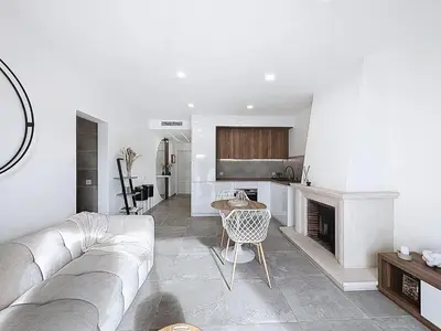 a living room with a couch and a table at Albufeira prime stay 2 in Albufeira