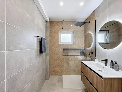 a bathroom with a sink and a mirror at Albufeira prime stay 2 in Albufeira