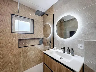 a bathroom with a sink and a mirror at Albufeira prime stay 2 in Albufeira