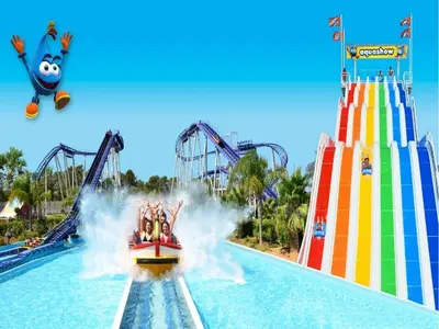 a group of people riding on a roller coaster at a water park at Apartamentos Casa Brito, Boliqueime by AlgarveBlossom in Boliqueime