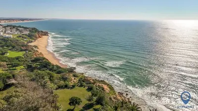 an aerial view of the ocean and a beach at Balaia Mar 63A by MTPhomes in Albufeira