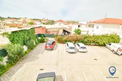 a group of cars parked in a parking lot at Eva Andorinha 2 Pax by MTPhomes in Ferreiras