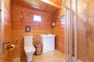 a bathroom with a toilet and a sink and a shower at Vistas Algarve in Loulé