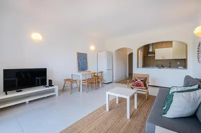 a living room with a couch and a table at Apartment Sonia in Albufeira