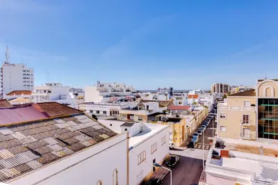 a view of a city skyline with buildings at Blife Anya private apartment in Faro