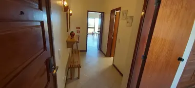 a room with a hallway with a figurine on the floor at Albufeira Apartment, Pool and Sea view in Albufeira