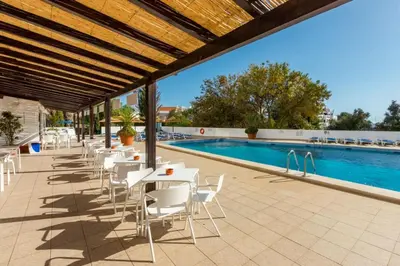 an aerial view of a resort with a pool at Sea House Apartment - Private Condo with 4 Pools, Jacuzzi & Tennis Court in Albufeira