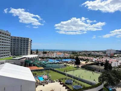 a view of a tennis court in a city at Apartamento Gaivotas in Albufeira