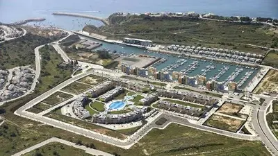 an aerial view of a harbor with a marina at Marina de Albufeira - Apartamentos Turísticos da Orada in Albufeira