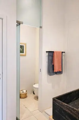 a bathroom with a sink and a toilet at Espaço Luzitano, fabulous and stylish spot, Faro city center, Wi-fi in Faro