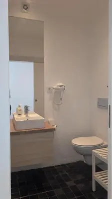 a bathroom with a sink and a toilet at Albufeira Spring, Summer & Fall in Albufeira