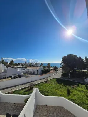 a view of the ocean from the balcony of a house at O Forte by MTPhomes in Albufeira