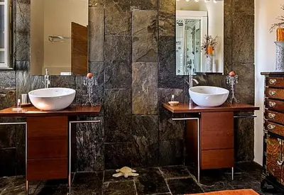 a bathroom with two sinks and a large mirror at Stunning home with nice pool in Albufeira