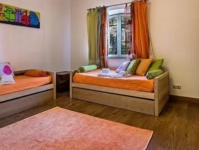 a room with two beds and a window at Stunning home with nice pool in Albufeira