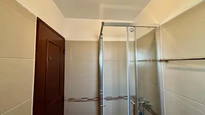 a shower with a glass door in a bathroom at Vilamoura Grand Terrace 2 by Homing in Vilamoura