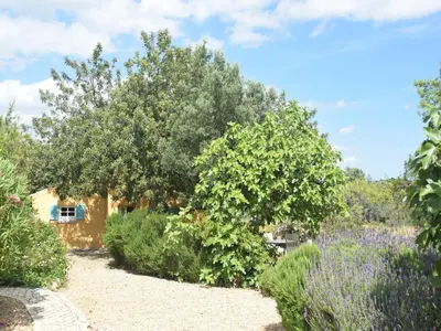 a swimming pool in a yard with a patio at Algarve Casa with Pool in Loulé