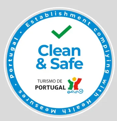 a blue clean and safe logo at Forte Apartment in Albufeira