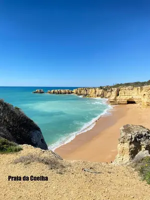 a view of the beach from the cliffs at Vista Mar Apartamento in Albufeira