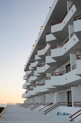 a building with stairs on the side of it at INATEL Albufeira in Albufeira