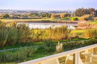 a view of a lake from a balcony at Laguna - Vilamoura in Vilamoura