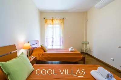 a small room with a bed and a window at Villa AcquaMarina - 5 bedroom, water front villa in Albufeira