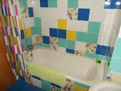 a bathroom with a bath tub and a toilet at T1 e T2 Marina Albufeira apartments in Albufeira