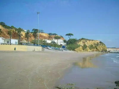 a view of a beach with houses and the ocean at Jazzy Cool Apartment Near White Sand Beaches in Albufeira