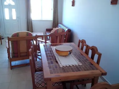 a wooden table with a bowl on top of it at Iconic Apartment with 2 Bedrooms in Albufeira