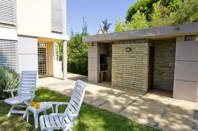 a swimming pool with a fence around it at Villa Lake View in Quarteira