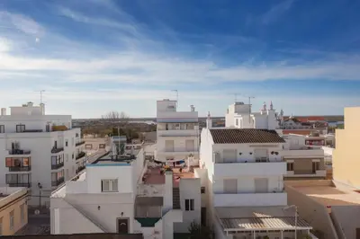 a view of a city with white buildings at Faro Boutique Hotel in Faro