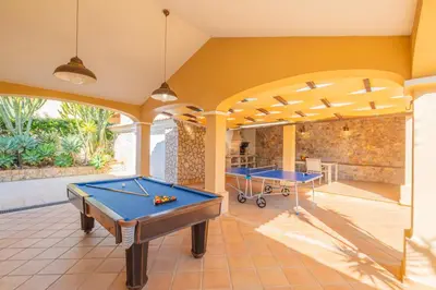 a pool room with two ping pong tables at Villa Florença by Algarve Vacation in Albufeira