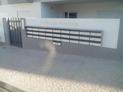 a building with a sign that reads cubic medicine at Edifice Ibérico in Albufeira