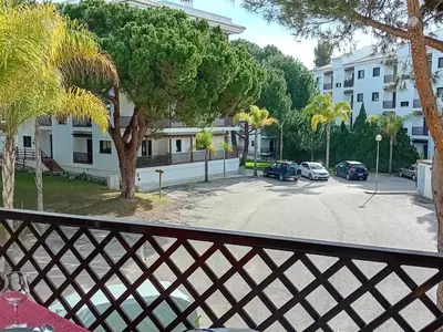 a balcony with a view of a parking lot at Apartamento Falesia 6 B in Albufeira