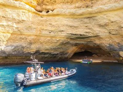 a group of people on a raft in a cave at Villa Mauritius by Algarve Vacation in Albufeira