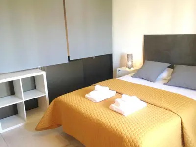 a hotel room with two towels on a bed at Casa Marina in Vilamoura