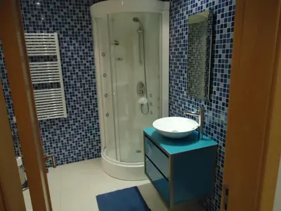 a bathroom with a sink and a shower at Marina Vilamoura Apartment in Vilamoura