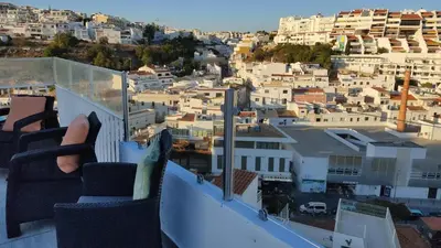 a view of a city from a balcony at Casa Alzira By ALzira in Albufeira