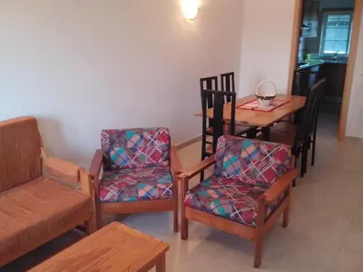 a room with a table and chairs and a dining room at Apartment with 2 Bedrooms B in Albufeira