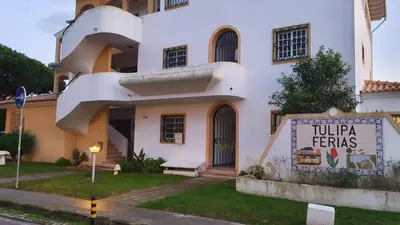 a building with a sign in front of it at Tulipa Férias (29506) in Vilamoura