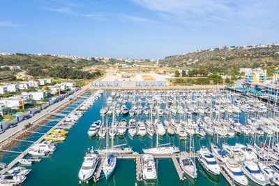 a bunch of boats docked in a marina at Funtastic Albufeira Marina 1b3b in Albufeira