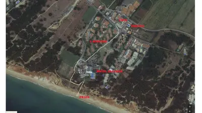 a map of a beach with red words on it at Ritta's house in Albufeira