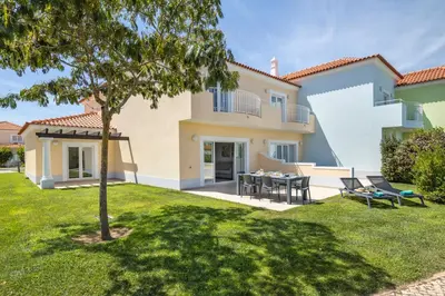a villa with a view of the yard at Eden Villas & Apartments in Albufeira