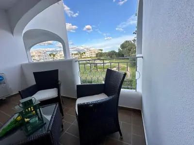 a balcony with two chairs and a view at Monteverde Kulle by FHR piscina & parking in Vilamoura