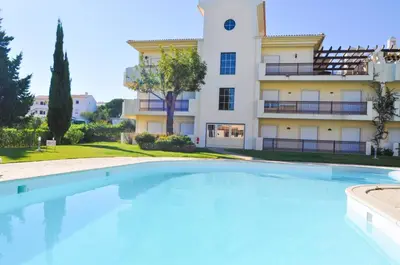 a large swimming pool in front of a building at Bogart at Casablanca by OCvillas in Albufeira