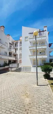 a street light in front of a building at Falesia Beach Apartment in Albufeira