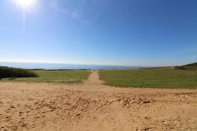 a dirt road in the middle of a field at Falesia Beach Apartment in Albufeira